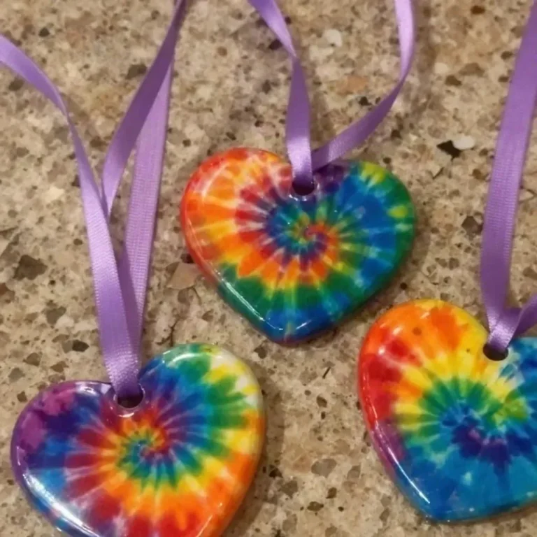 DIY swirled glue sun catchers hanging in a window