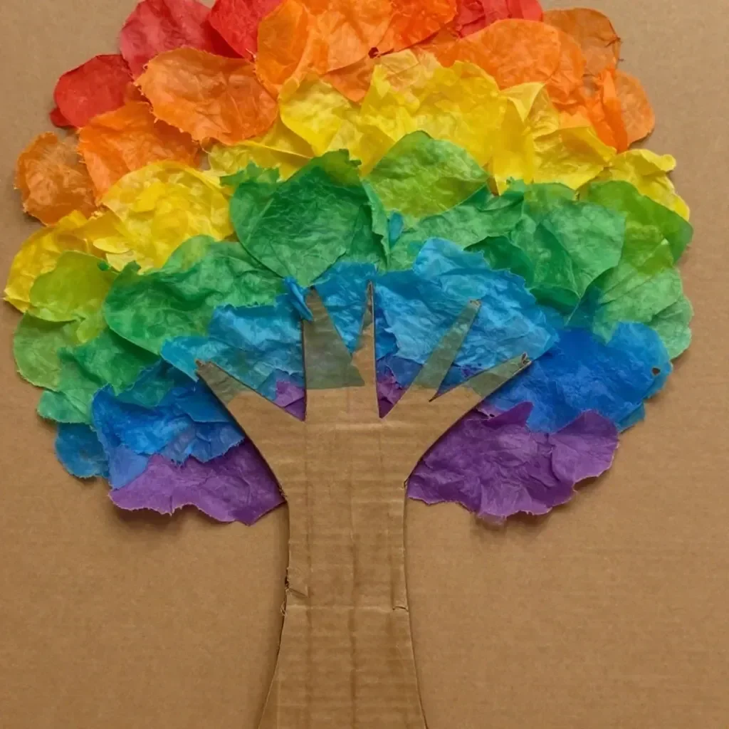 Colorful rainbow paper tree craft showcasing vibrant patterns and designs.